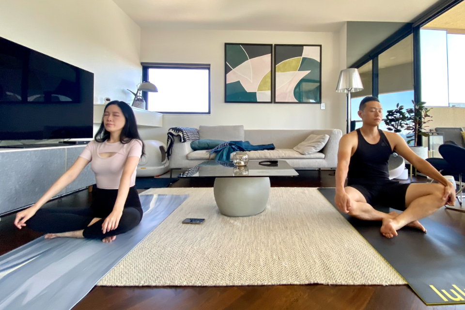 A small group yoga class outdoors